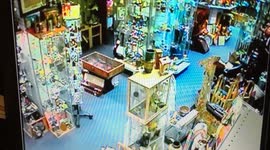 GHOST PASSES THROUGH PICTURES LIFTING THEM UP AND PUSHING ONE OVER
