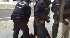 policeman arrested protestor