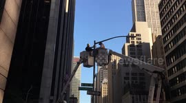 How many NYC workers does it take to change a lightbulb?