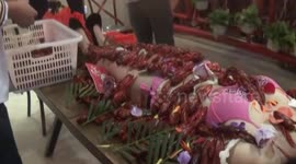 Newly-opened restaurant offers lobster dish putting on model's body