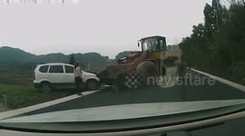 Out-of-control digger rams people carrier off the road