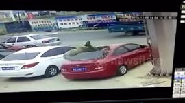 Man miraculously survives falling from second-storey of building onto car
