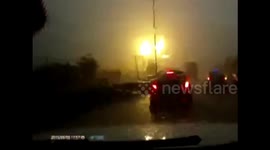 Dashcam captures moment lightning hitting a lamppost in China