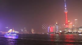 Shanghai lights up landmark in French national colours after Paris attacks