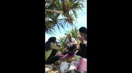A sudden wave washed away the entire picnic of the guys!