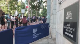 Mourners gather outside the British Consulate in Hong Kong