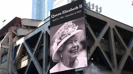 New York: Image of Queen Elizabeth II flashes on electronic display outside Port Authority Bus Terminal