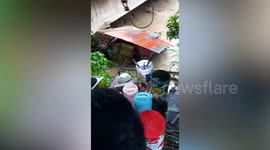 House dragged into river as Typhoon Inday moves by the Philippines