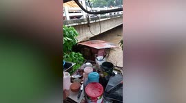 House dragged into river as Typhoon Inday moves by the Philippines