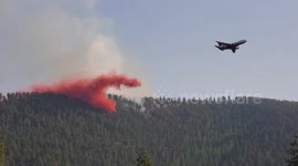 Planes dump retardant to tackle wildfire in Montana
