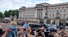 Crowds cheer King Charles as he departs Buckingham Palace on Saturday evening
