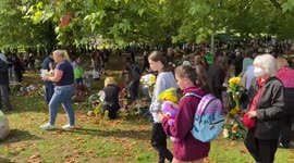 Thousands of people lay flowers in Green Park in tribute to the Queen.