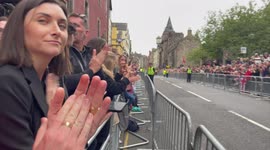 Well-wishers applauded as the Queen's coffin arrived in Edinburgh on Sunday
