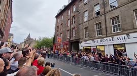 UK: Mourners Line Up On Roadside As Queen Elizabeth II’s Coffin Taken To Edinburgh 3