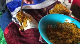 Dried herbs burned on top of patients' bodies in bizarre healing therapy in Thailand