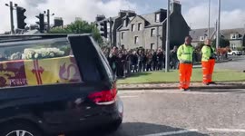 UK: Mourners Line Up On Roadside As Queen Elizabeth II’s Coffin Taken To Edinburgh 4