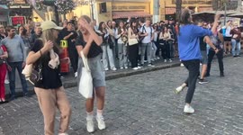 Young people dance in Odesa, Ukraine, to celebrate success of Ukraine's counter-offensive