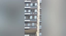 Father rescues his toddler hanging from 5th-floor window of flat in China