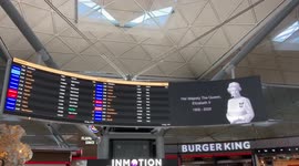 HM The Queen banners at Stansted Airport, London