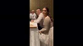 Woman goes viral catching her husband watching RUGBY during wedding