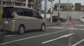 Motorist becomes real-life 'Ghost Rider' after his motorbike catches fire on road in Japan