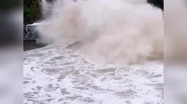 Strong winds brought by Typhoon Muifa send huge waves against seawall in China