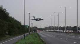 Her Majesty The Queen's coffin returns to London on board RAF C-17