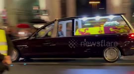 Crowds gather as coffin of Queen Elizabeth II arrives at her Buckingham Palace home for final time