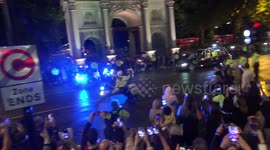 Queens coffin passes by Marble Arch as thousands wait on sidewalks