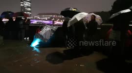 The long queue to see the Queen at Westminster Hall. People waiting had to brave the rain