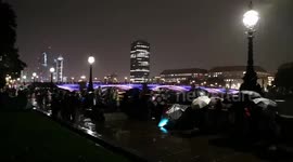 Rain, drinks, batteries and mourners: A look at the crowd waiting overnight to see Queen Elizabeth lying in state at Westminster Hall