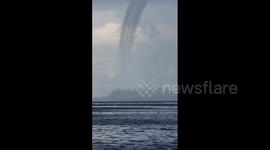 Large waterspout hits Cayman Islands