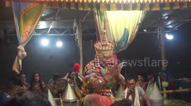 Thai traditional dancers hold folk ceremony 'to cure toddler's birthmark'