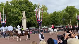 Royal Household Cavalry arrives back at Buckingham Palace