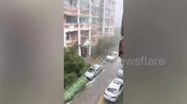 Heavy rain pummels suburbs as China braces for Typhoon Muifa impact