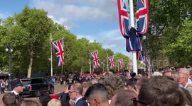 Crowd burst into applause as Queen's coffin carried down The Mall