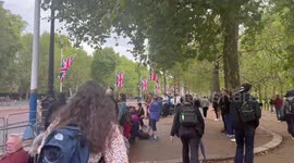 People gather to watch Queen Elizabeth’s II procession in London, UK