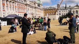 Woman waiting to see Queen's coffin is wheeled away by medics after allegedly collapsing