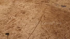 On Horseguards Parade some people have drawn a message to the Queen out if the gravel