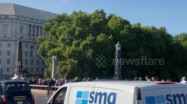 Crowds queue on Lambeth Bridge to see Queen’s coffin vigil at Westminster Hall