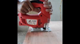 Carpenter work. Ply cutting in India , carpenter working with an electric jigsaw cutting wood