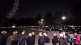 Queue to see Queen Elizabeth II lying in state as seen near the London Eye on Wednesday night