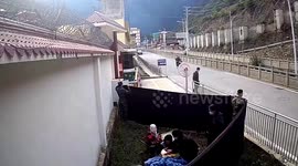 Armed police build up temporary delivery room outside camp for pregnant woman to give birth in China