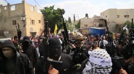 Relatives carry the body of Palestinian Uday Salah, 17, who was killed during clashes with Israeli forces