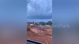 Thin waterspout forms along Indonesian coast shocking beachside residents