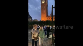 Londoners leaving Westminster Hall,  London, UK having seen Queen Elizabeth II