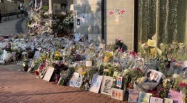 Queen Elizabeth II: Hundreds of floral tributes left outside British Consulate General in Hong Kong
