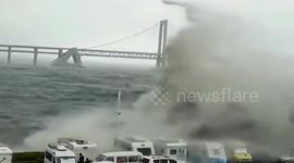 Waves whipped up by Typhoon Muifa crash against China's eastern coast