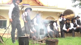 Mourners dress as 1800s cowboys for funeral in rural Thailand
