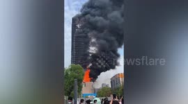 Huge fire engulfs 44-storey skyscraper in southern China